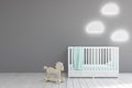 BabyÃ¢â¬â¢s room, gray walls Royalty Free Stock Photo